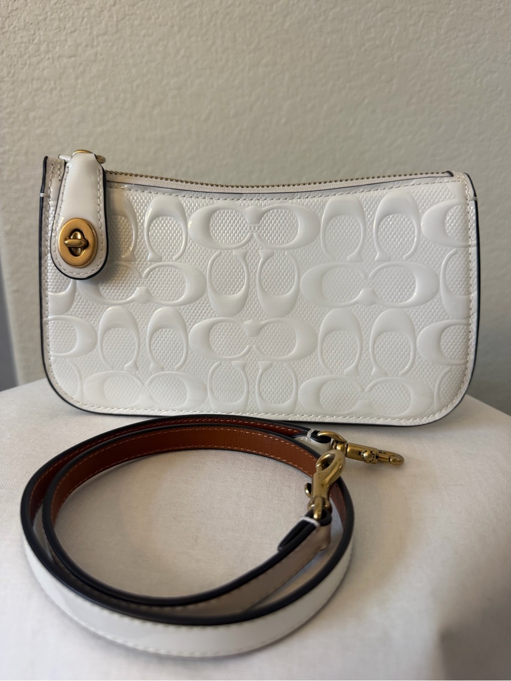 Turn Lock Coach Swinger White Signature Embossed Shoulder Bag with Gold Hardware